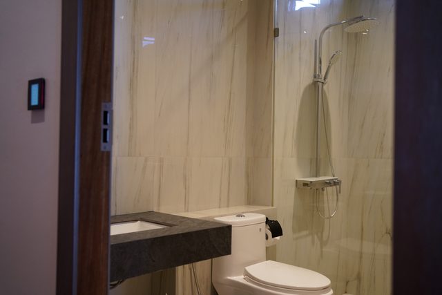 Ensuite Italian Marble Bathroom with Glass Partition & Rain Shower